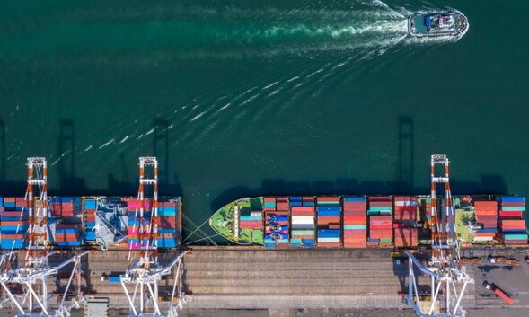 Container ship in loading dock