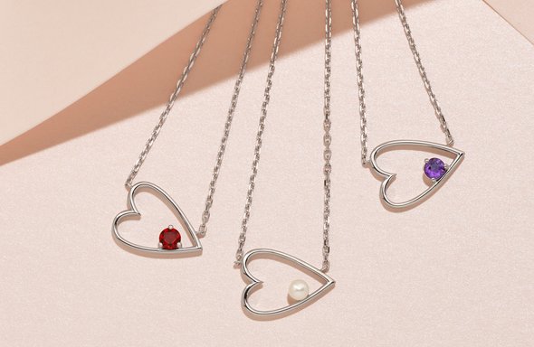 A collection of heart shaped pendants