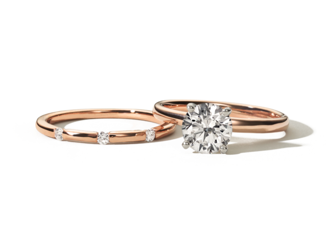 A solitaire engagement ring and matching wedding band