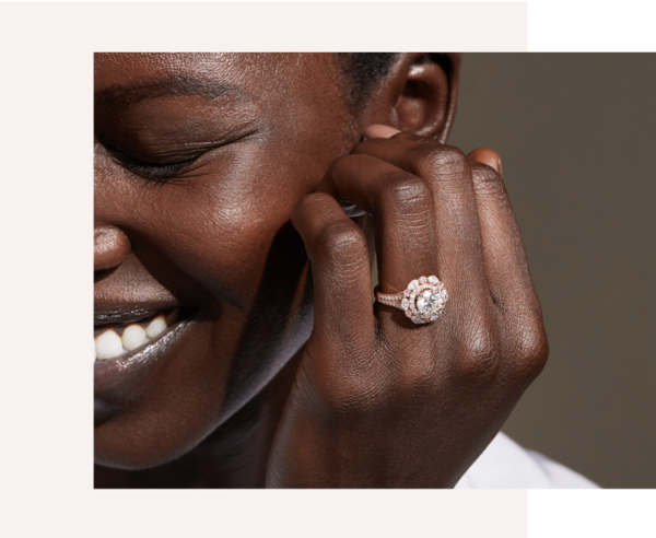 Image of a woman wearing a diamond engagement ring