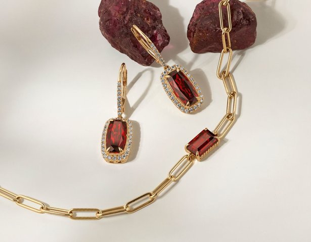 A pair of garnet earrings and a garnet necklace
