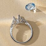 A diamond engagement ring with an oval center stone