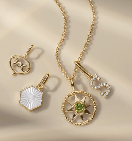 A group of three engagement rings with different shaped center stones