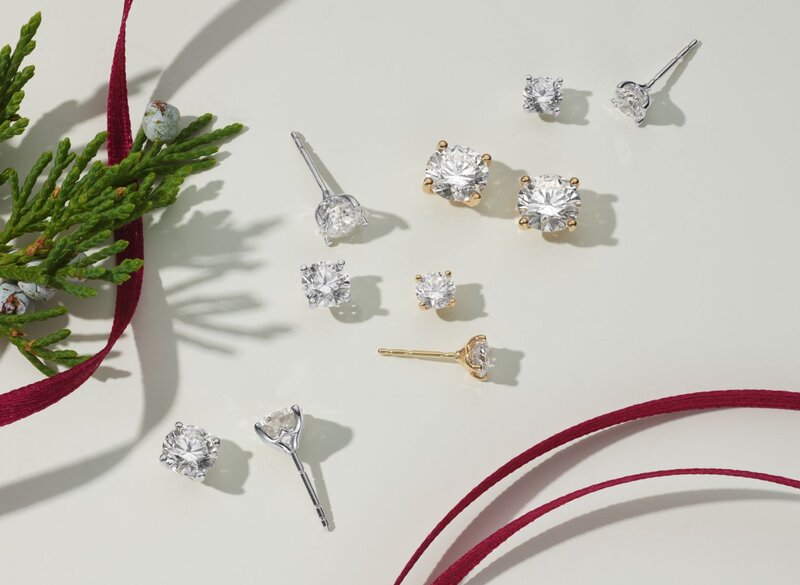 A collection of diamond stud earrings