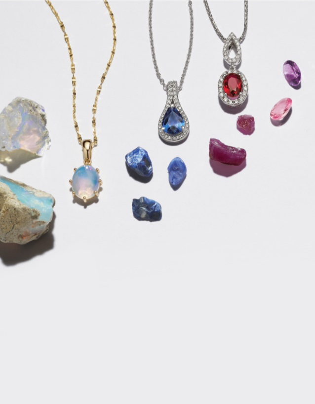 A collection of gemstone jewelry and raw gemstones