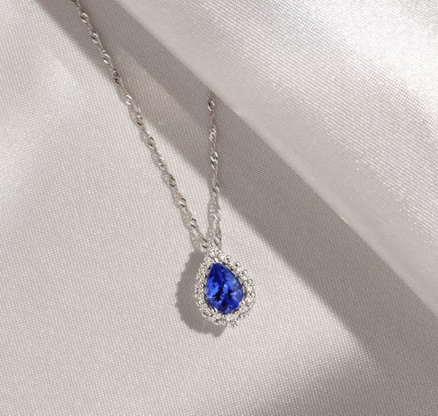 white gold necklace with pear shaped tanzanite stone