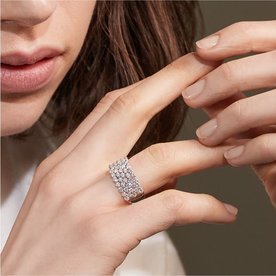 A woman wearing a diamond fashion ring