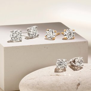 Three sets of diamond stud earrings