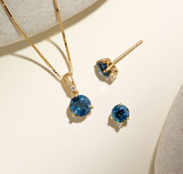 topaz jewelry: a round topaz necklace and round topaz stud earrings
