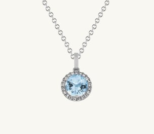 A blue topaz and white sapphire floral pendant