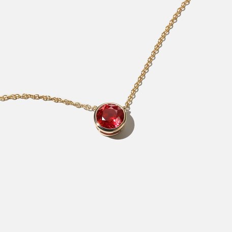 A ruby solitaire pendant