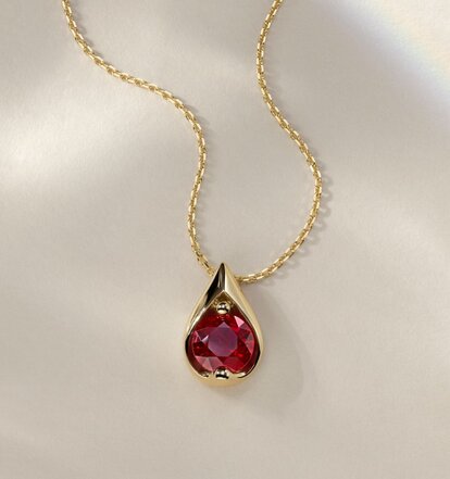 A colored gemstone pendant necklace