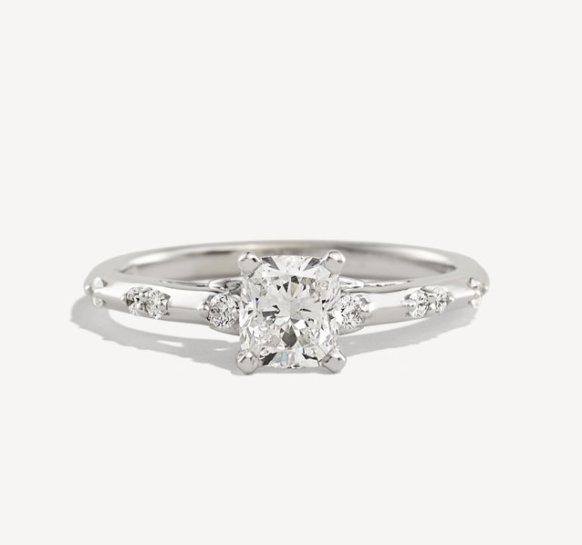 A diamond solitaire engagement ring