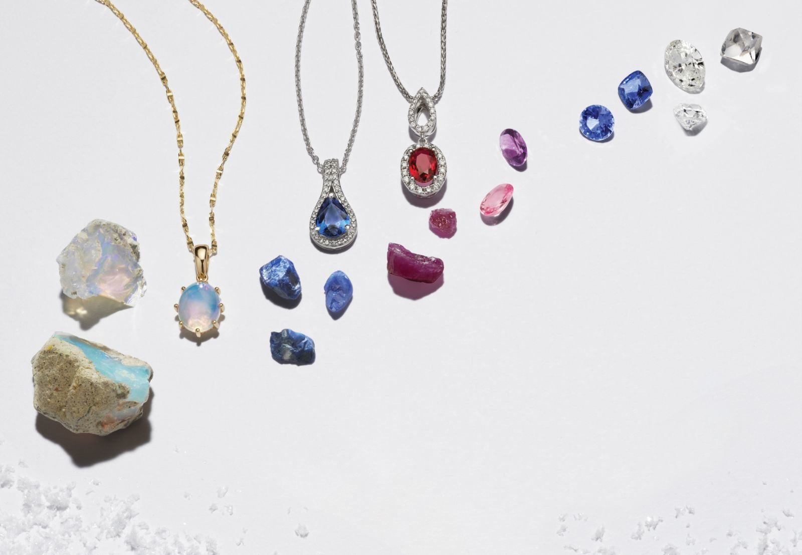 A collection of fashion jewelry with raw gemstones
