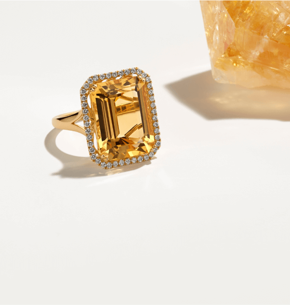 A gemstone and diamond fashion ring