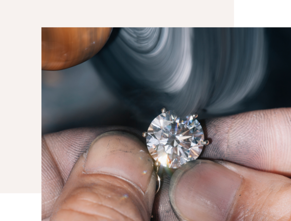 Image of a solitaire engagement ring being polished
