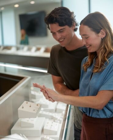 A couple shopping in a Shane Co. store