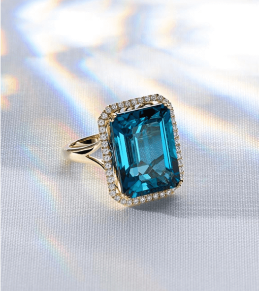 A gemstone and diamond fashion ring for December birthstones.