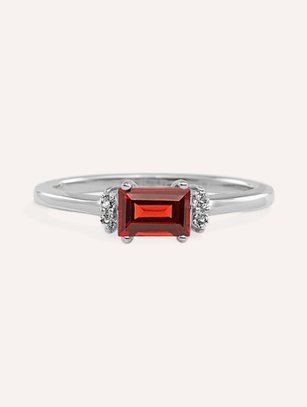A garnet and diamond fashion ring