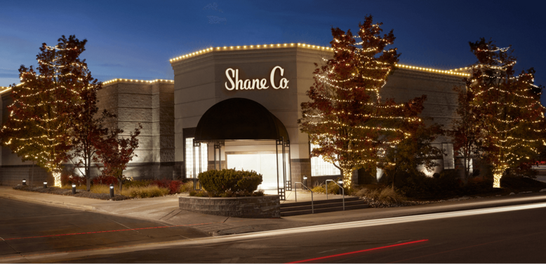 A Shane Co. store decorated with holiday lights
