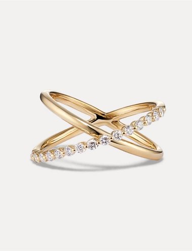 A natural diamond crossover ring in 14k yellow gold