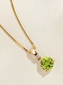 A peridot solitaire pendant