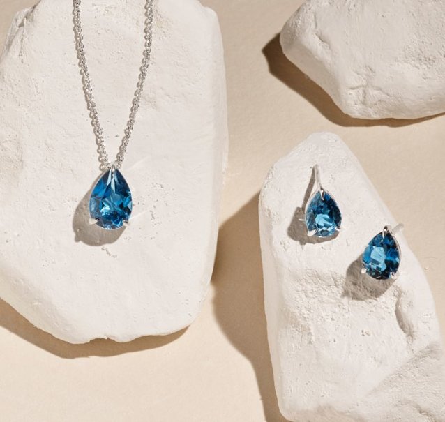 topaz jewelry: a pear shaped topaz necklace and pear shaped topaz earrings