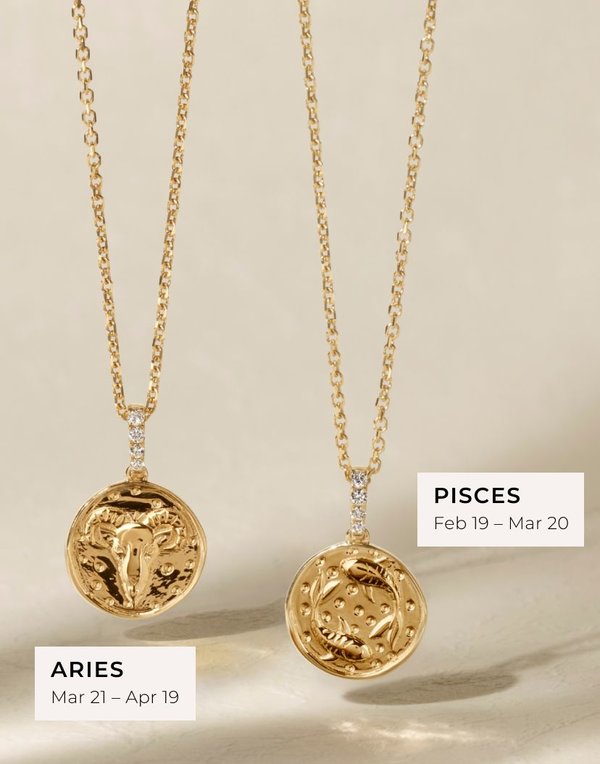 image of two zodiac sign pendants, one with aries and one with pisces