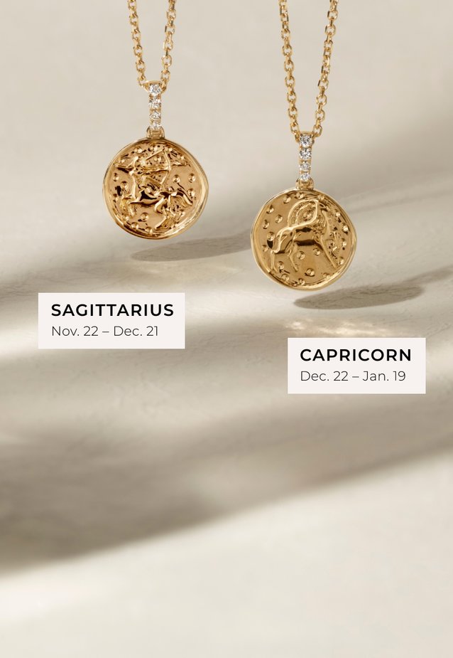 Two zodiac pendant necklaces