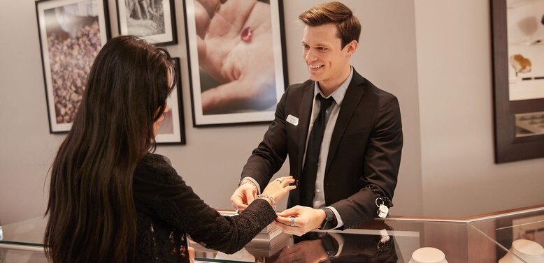 A Shane Co. store decorated with holiday lights