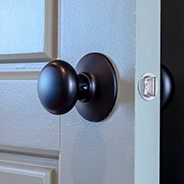 An interior door handle installed on a interior door.