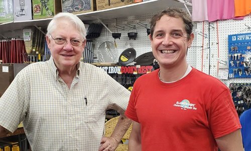 Blankenships' staff smiling at the camera.