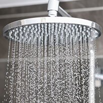 A waterfall style showerhead fixture.