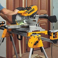 A DeWalt table aw being used by a contractor.