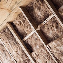 Insulation added to unfinished wall.