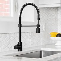 A black kitchen faucet.