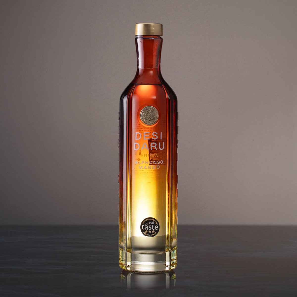 A bottle of Desi Daru Alphonso Mango Vodka