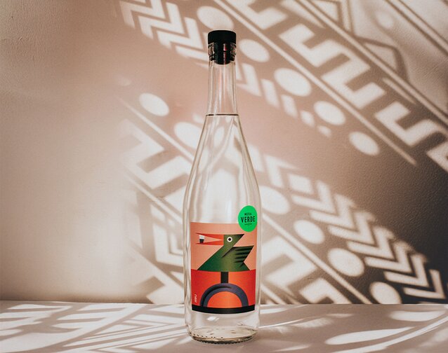 A bottle of Mezcal Verde Amarás.