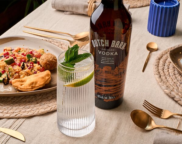 A bottle of Dutch Barn Orchard Vodka with a spritz serve