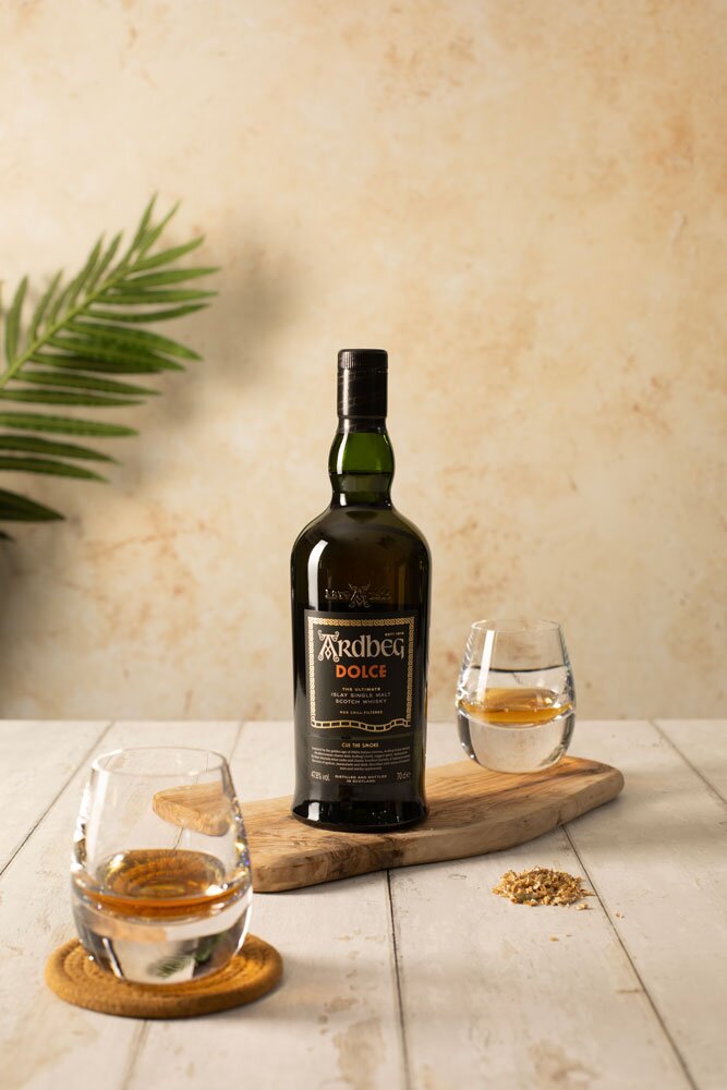 Ardbeg Dolce whisky bottle with glasses