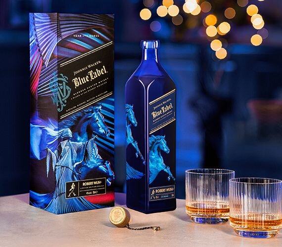 Johnnie Walker Blue Label Year of the Horse 2026 and two whisky glasses