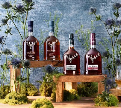 Dalmore whisky bottles surrounded by thistles