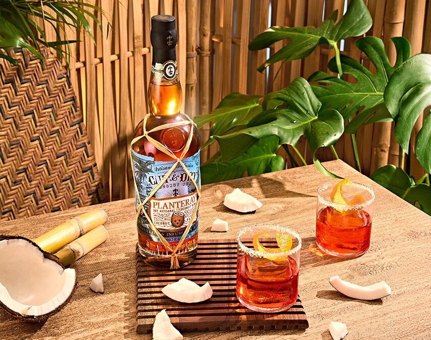 A bottle of Planteray Cut and Dry and cocktail