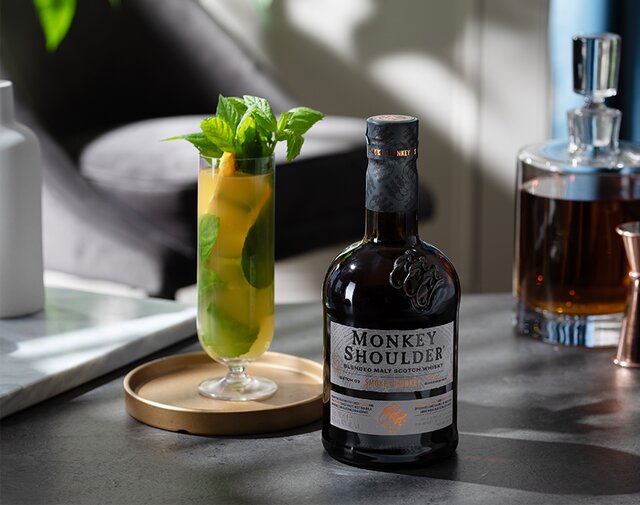 A bottle of Monkey Shoulder Smokey Monkey and cocktail