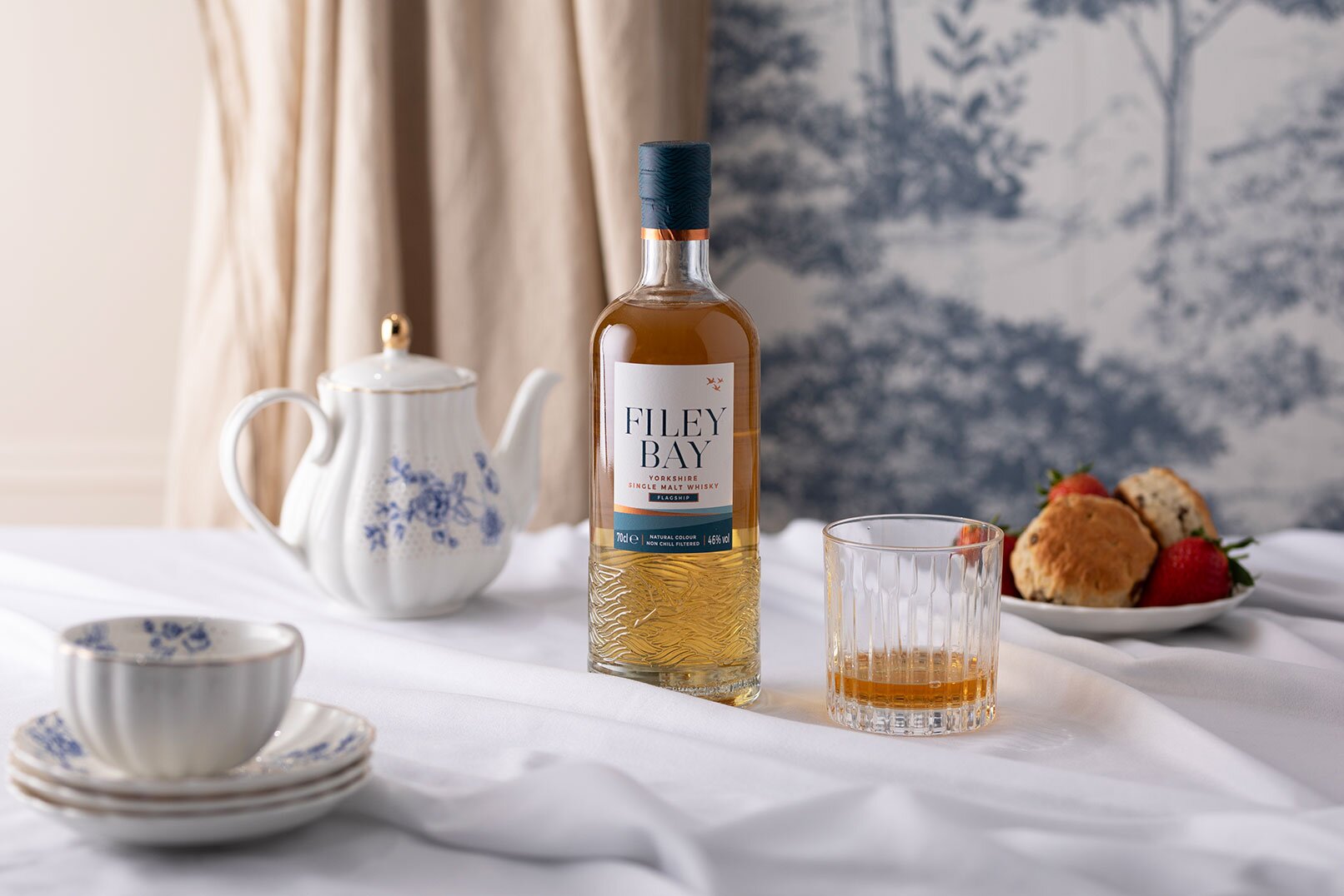 A bottle of English whisky, Filey bay.