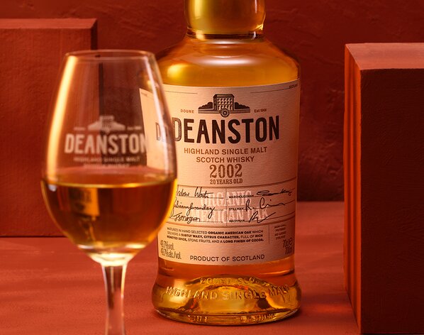 Bottle of Deanston 20 Year Old 2002 Organic Whisky with a dram