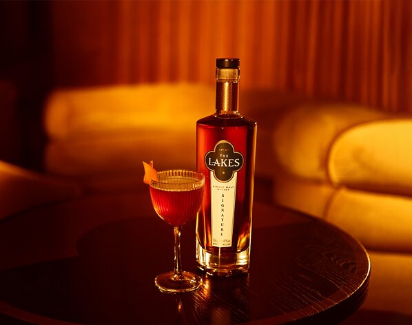 A bottle of The Lakes Signature Single Malt with their signature Eclipse cocktail.