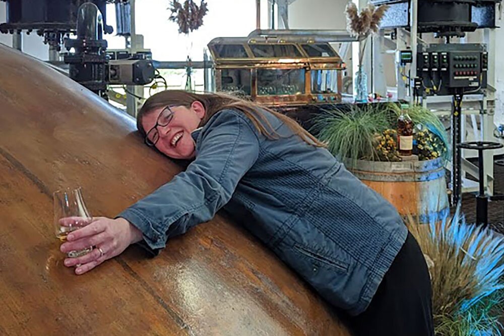 Emma Symons hugging a still