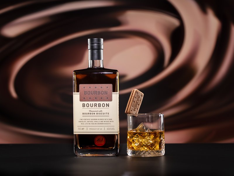 Bottle of Bourbon Bourbon next to an Old Fashioned cocktail