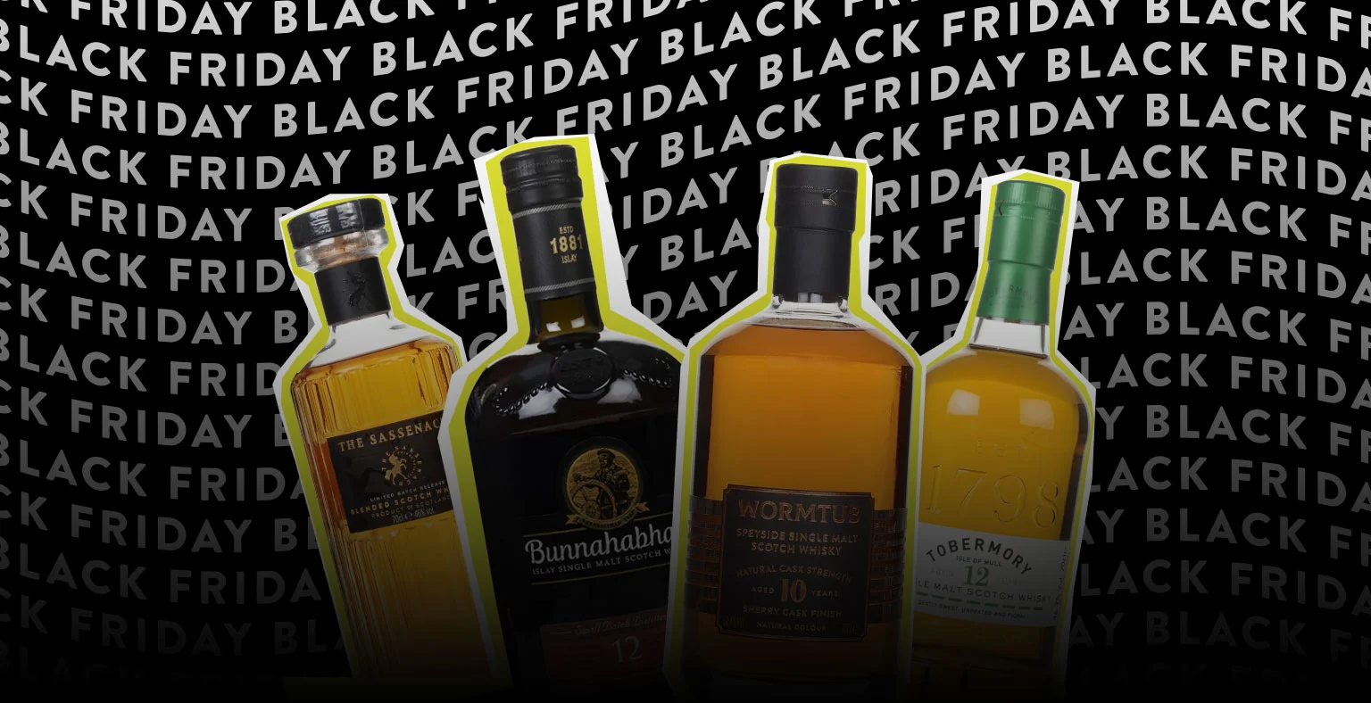 Four bottles of whisky in front of  a Black friday banner.